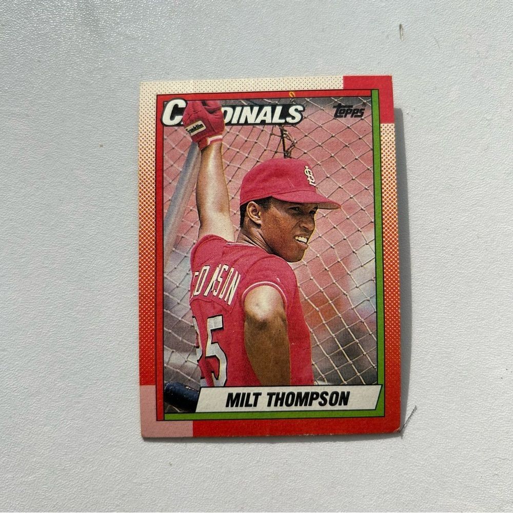Topps Yellow and Black Baseball Card with Player Stats
